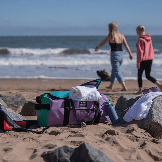 Montrose bags on the beach with friends