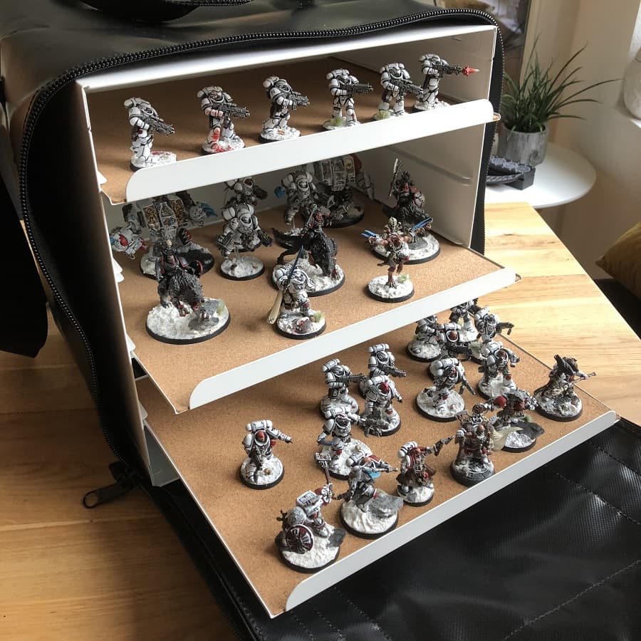 Custom transport case with padded shelving for miniatures